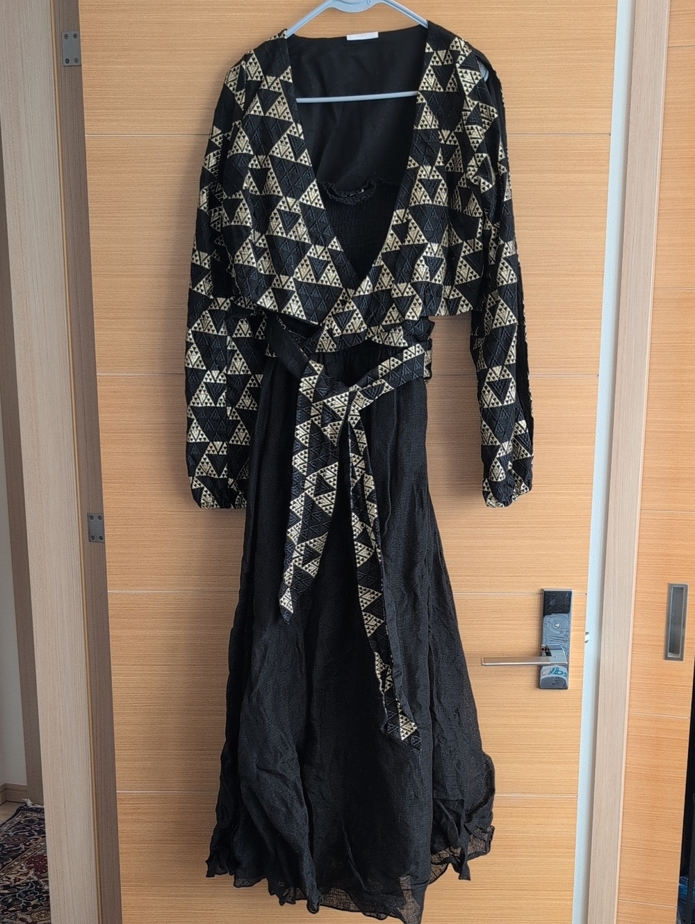 Black Stapless Maxi Dress And Detachable Jacket With Gold Geometric Accents